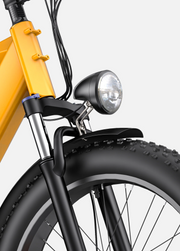 Close-up of a bicycle's front headlight and suspension fork on a white background