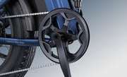 Close-up of a motorcycle chain and sprocket on a blurred background