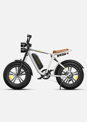 White electric fat bike with black tires on a light gray background